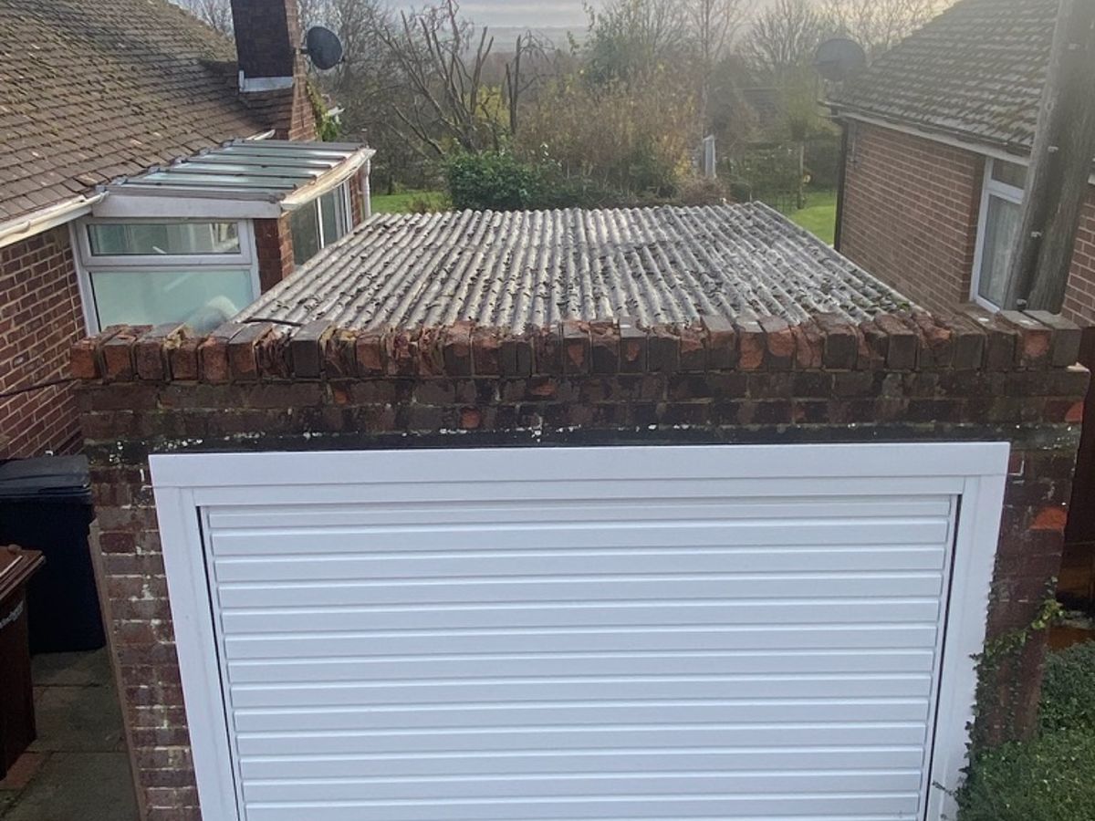 Leaking Garage Roof: Repair or Replace? A Practical Guide