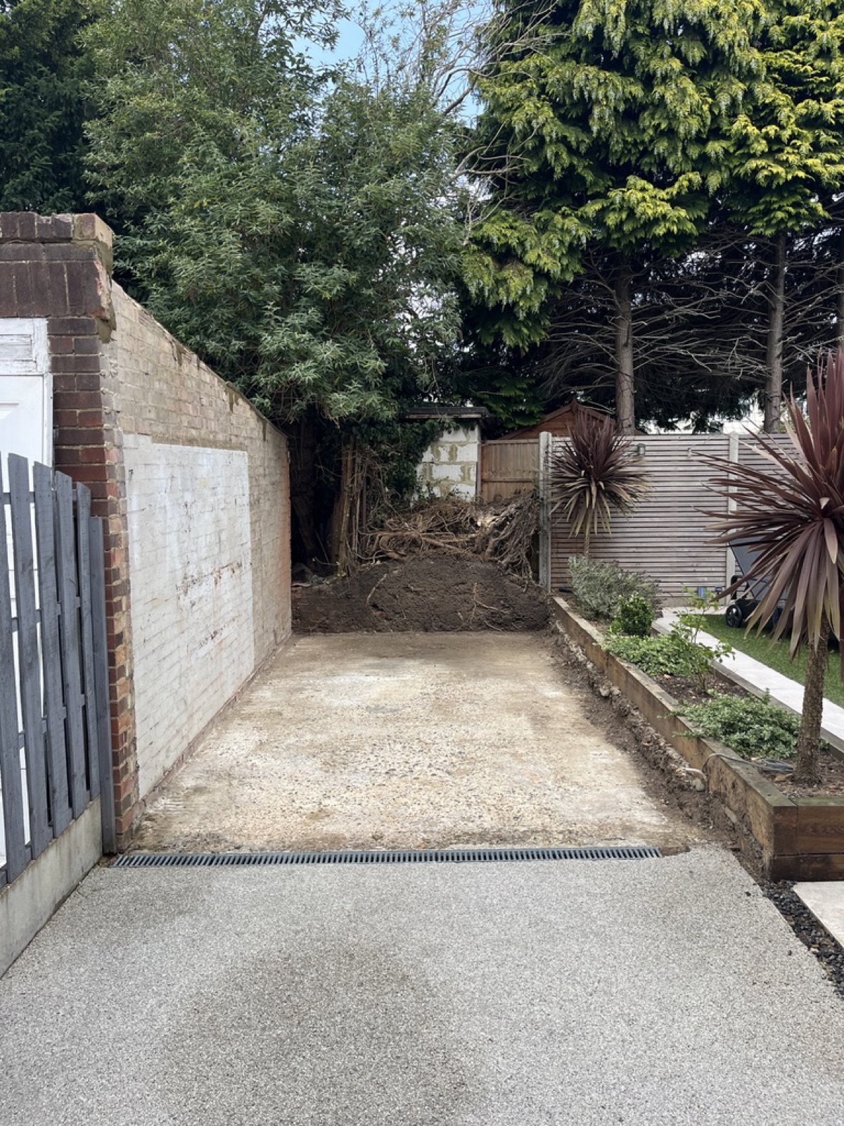 Garage demolition and site clearance in progress
